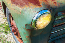 Beautiful Headlight On A Rusty Truck