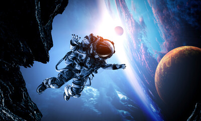 Wall Mural - Astronaut at spacewalk . Mixed media