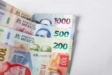 Wall Mural - new bank notes of mexican peso background. 100, 200, 500, 1000 pesos