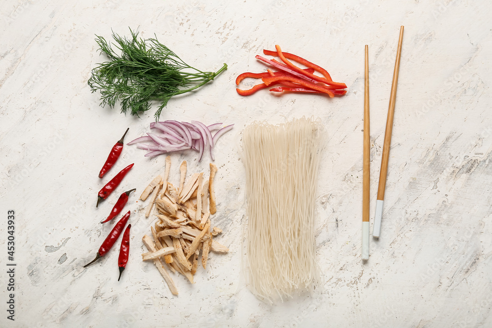 Composition with ingredients for Thai soup on light background