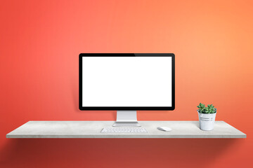 Poster - Computer display mockup on white desk with plant, keyboard and mouse beside. Red wall in background