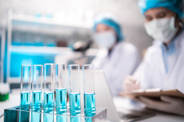 Wall Mural - scientist working with scientific equipment in laboratory science research term for medicine by chem