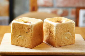 Poster - Sausage cube bread on a cutting board