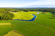 © Johnér - Aerial view of cultivated field and small river