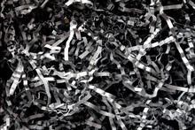 Black Shredded Paper As Background