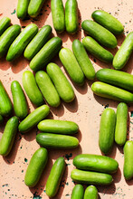 Overhead View Of Cucumbers On Concrete Surface