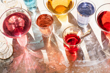 High Angle View Of Various Colorful Drinks In Glasses