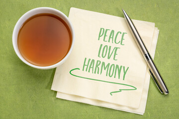 Wall Mural - peace, love, harmony - inspirational handwriting on a napkin with a cup of coffee, spirituality, mindset and personal development concept