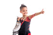 Portrait of a little girl figure skater with skates in her hands showing gesture of success