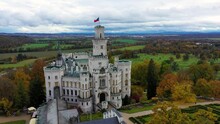 Drone View Of Medieval Castle In Hluboka Nad Vltavou, Czech Republic. Castle Hluboka Nad Vltavou Is One Of The Most Beautiful Castles In Czech Republic. Hluboka Nad Vltavou In Autumn With Red Foliage
