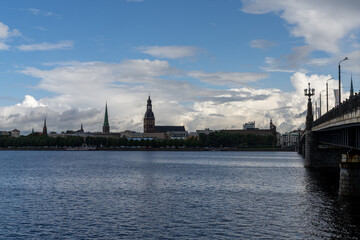 Wall Mural - the Daugava River and Akmens Tilts Bridge with the skyline of Riga in the background