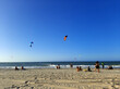 People practicing kitesurfing on Cumbuco beach, in the state of Ceara