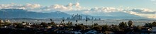 Downtown Los Angeles And San Gabriel Mountains In Winter Panorama