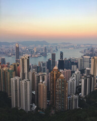 Wall Mural - Urban scenery of skyscrapers in the city of Hong Kong during a beautiful sunset