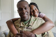 © Creative Flame - Feeling happy dad is home, family is complete, African American military, father and daughter
