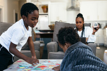 Black Kids Playing Board Games, Puzzle, At Home, While Mom Is Working