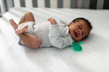 Newborn Crying In Baby Crib, African American