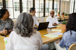 © Creative Flame - Diverse small business having team meeting