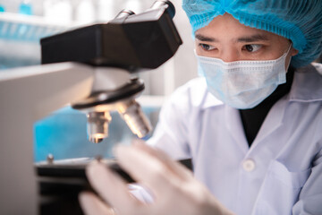 Wall Mural - scientist working with scientific equipment in laboratory science research term for medicine by chem