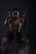© Creative Flame - African American man doing intense sports training, exercises