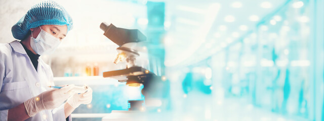 Wall Mural - banner background of scientist research in medical science laboratory, medicine technology with biol