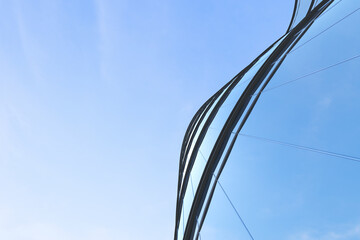 Aufkleber - Low angle view of futuristic architecture, Skyscraper of office building with curve glass window, 3D rendering.