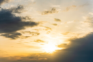 Wall Mural - Stunning view of a dramatic sunset with some clouds. Romantic sky, natural background, Sardinia, Italy.