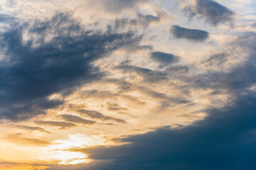 Wall Mural - Stunning view of a dramatic sunset with some clouds. Romantic sky, natural background, Sardinia, Italy.