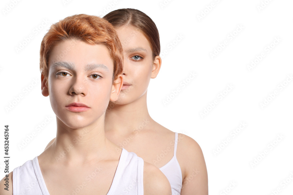 Teenagers with dyed eyebrows on white background