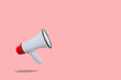 Business Communication and Marketing Concept : Red megaphone floating on floor for announcement and advertisement.