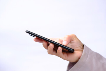 Poster - Businessman using smartphone on white background and technology connection concept