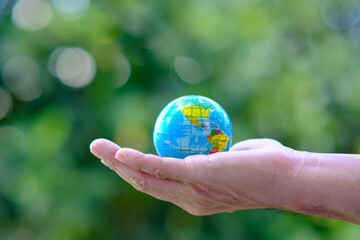 Poster - earth in hand