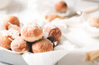 Mini donuts with powder sugar and coconut