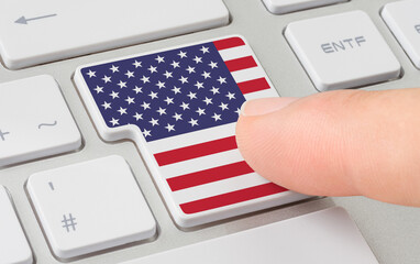 Wall Mural - a keyboard with a labeled button - flag of the united states of america