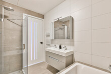 Bathroom Interior With Shower Cabin And Sink