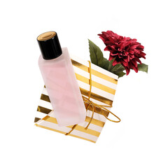 Wall Mural - Composition with golden packaging box, perfume and flower isolated on white background