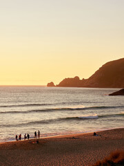 Wall Mural - Finisterre Sunset in Galicia, Spain. Mar de Fora beach and Nave cape in Costa da Morte. This is the final step in the Camino de Santiago.