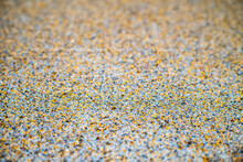 Color Flake Flooring Textured Background .Close Up.Color Flakes Make Resinous Flooring As Beautiful As It Is Practical.Concrete Floor,sprinkle With Flake Stone And Smooth.