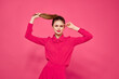 © SHOTPRIME STUDIO - pretty woman in pink shirt gesturing with hands fashion glamor pink background