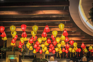 Wall Mural - Colourful lanterns shine on the ceiling of the mall in Ho Chi Minh City, Vietnam