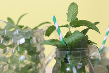 Closeup Of A Fresh Mojito Cocktail On A Checkered Table