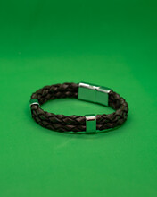 Green Bracelet On Black Background