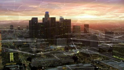 Famous Skyscrapers With Futuristic Network Over Downtown Los Angeles, California. United States. 
Aerial Connected View Of The City At Sunset.  Internet Of Things, Smart Cities, Big Data, AR.