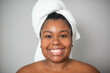 © Gabriel Trujillo - Happy black woman with towel on head