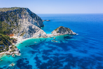 Wall Mural - Aerial view Agia Eleni beach in Kefalonia Island, Greece. Remote beautiful rocky beach with clear emerald water and high white cliffs