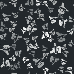 Wall Mural - Grey Water gun icon isolated seamless pattern on black background. Vector