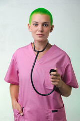 nurse with pink scrubs, green hair and positive attitude