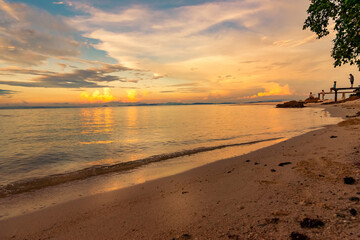 Wall Mural - Nature in twilight period which including of sunrise over the sea and the nice beach. Summer beach with blue water and purple sky at the sunset.	
