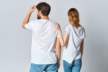 Canvas Print - man and woman in white t-shirts design studio back view mocap