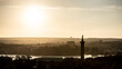© Trygve - Gothenburg, Sweden - June 29 2021: Silhouette of statue Kvinna vid havet, woman by the sea, on Sjömanstornet by Sjöfartsmuseet. Hisingen in the background.